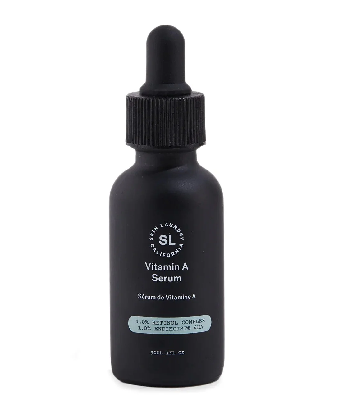 A black dropper bottle of Skin Laundry Vitamin A Serum, highlighting "1.0% RETINOL COMPLEX 1.0% ENDIMOIST® 4HA" on its label, against a white background.